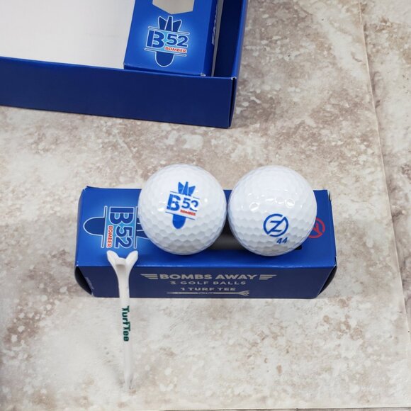 8 B52 Bomber Distance Golf Balls w/ 3 Turf Tees White Zero Friction Partial Pack - Picture 4 of 8